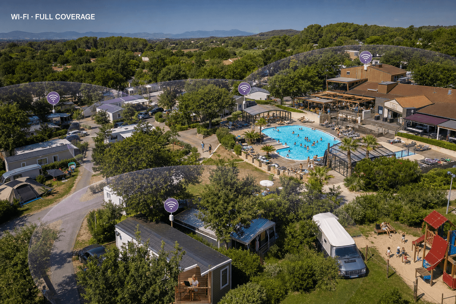 Vue aérienne d’un camping dont les mobil-homes, emplacements, piscine et restaurant bénéficient d’une couverture Wi-Fi complète
